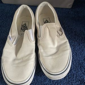 Cream slip on vans